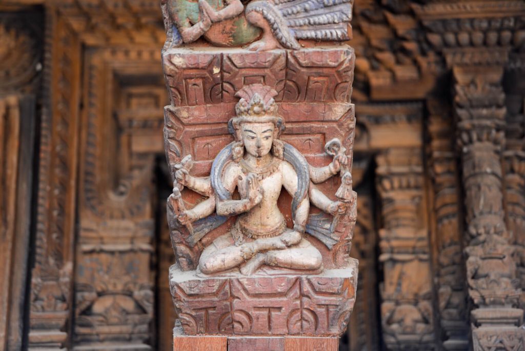 Elaborate wood-carved roof struts at the old Royal Palace in Patan.