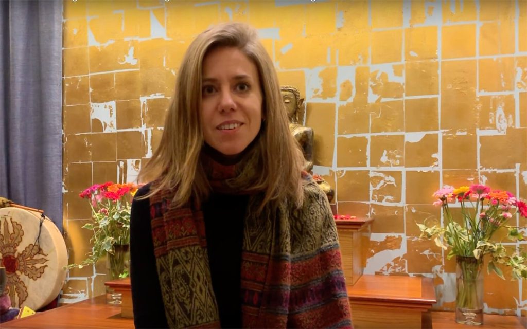 Still from Sara La Rocca Testimonial video. Sara talks about her experience on the Elton Yoga 2019 London Yoga Teacher Training.