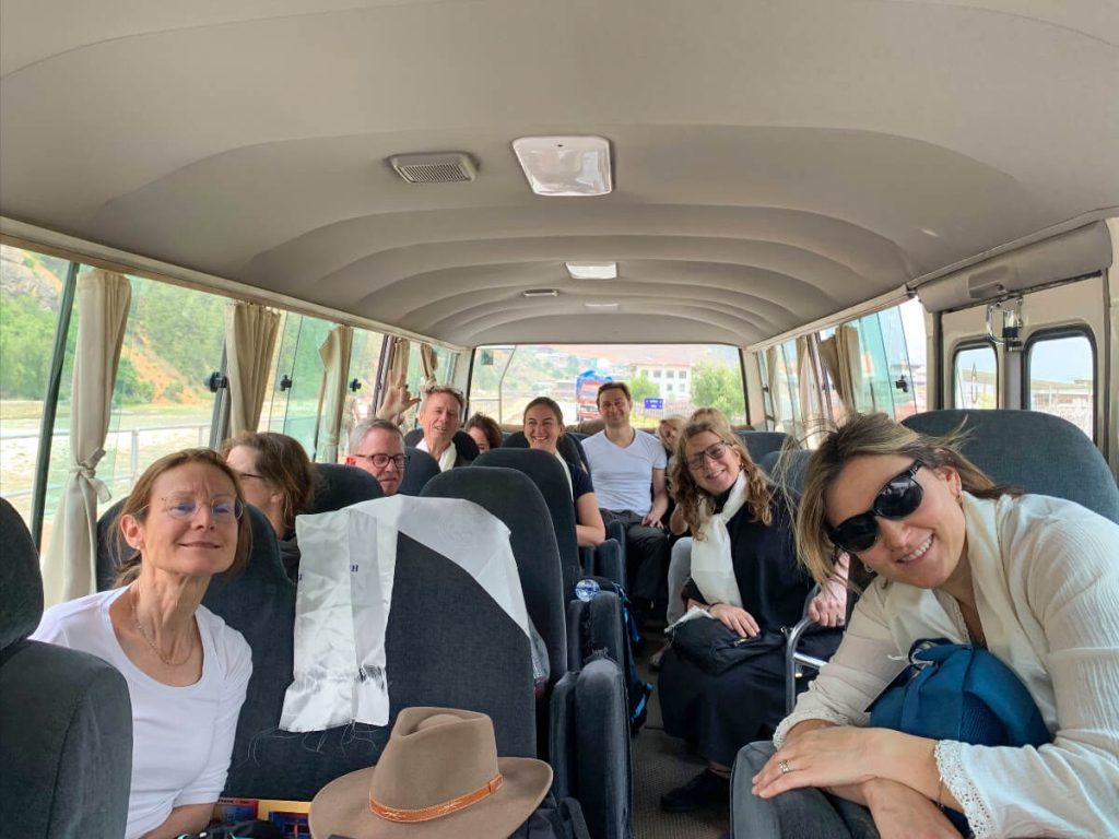 Students on the Elton Yoga Bhutan Yoga Adventure touring Bhutan by bus.