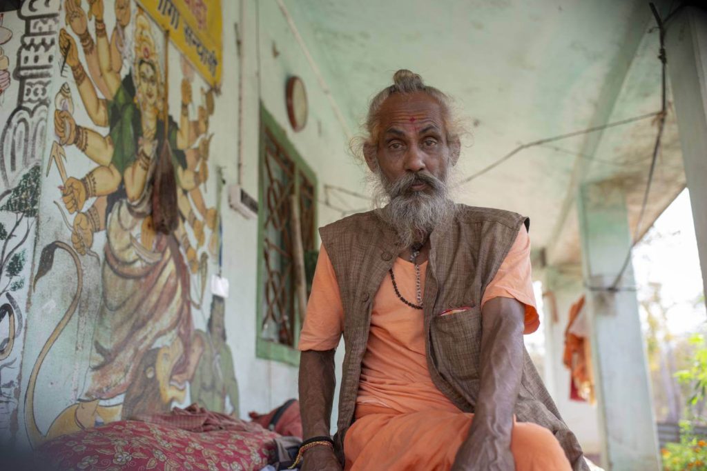 Yogi Baba, a humble, super fit yogi around 60 years old filled with vitality, with a great sense of humor and sparkling eyes. 