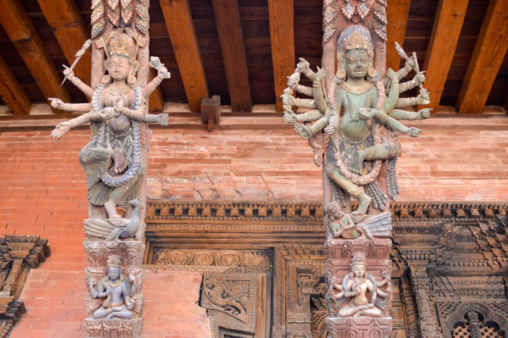 Elaborate wood-carved roof struts at the old Royal Palace in Patan.