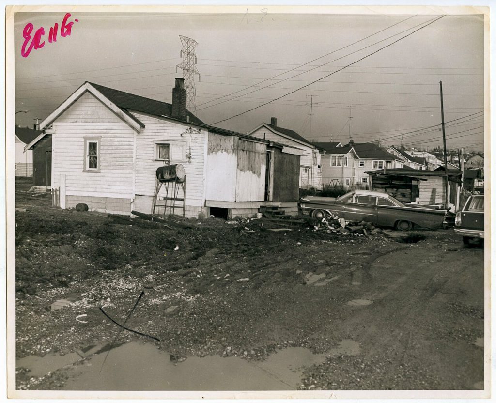 A black and white photograph of the crime scene where Sidney Albert MacDonald was murdered. Satans Angels clubhouse on Napier Street, Vancouver.