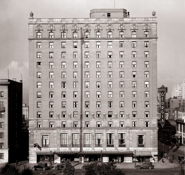 A black and white photograph of the Georgia Hotel, in downtown Vancouver.